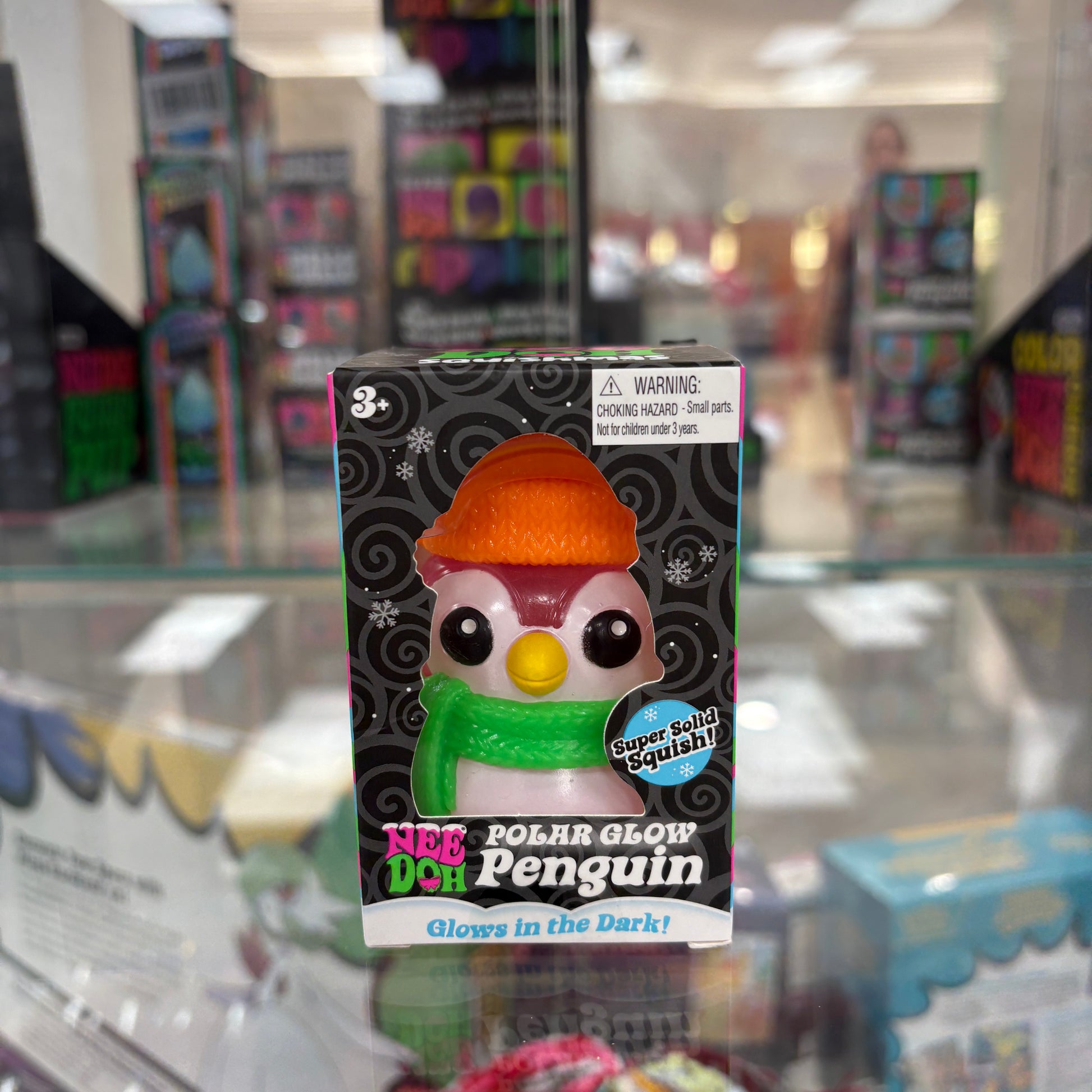 NeeDoh Polar Glow Penguin Squishy Fidget Toy Orange Hat