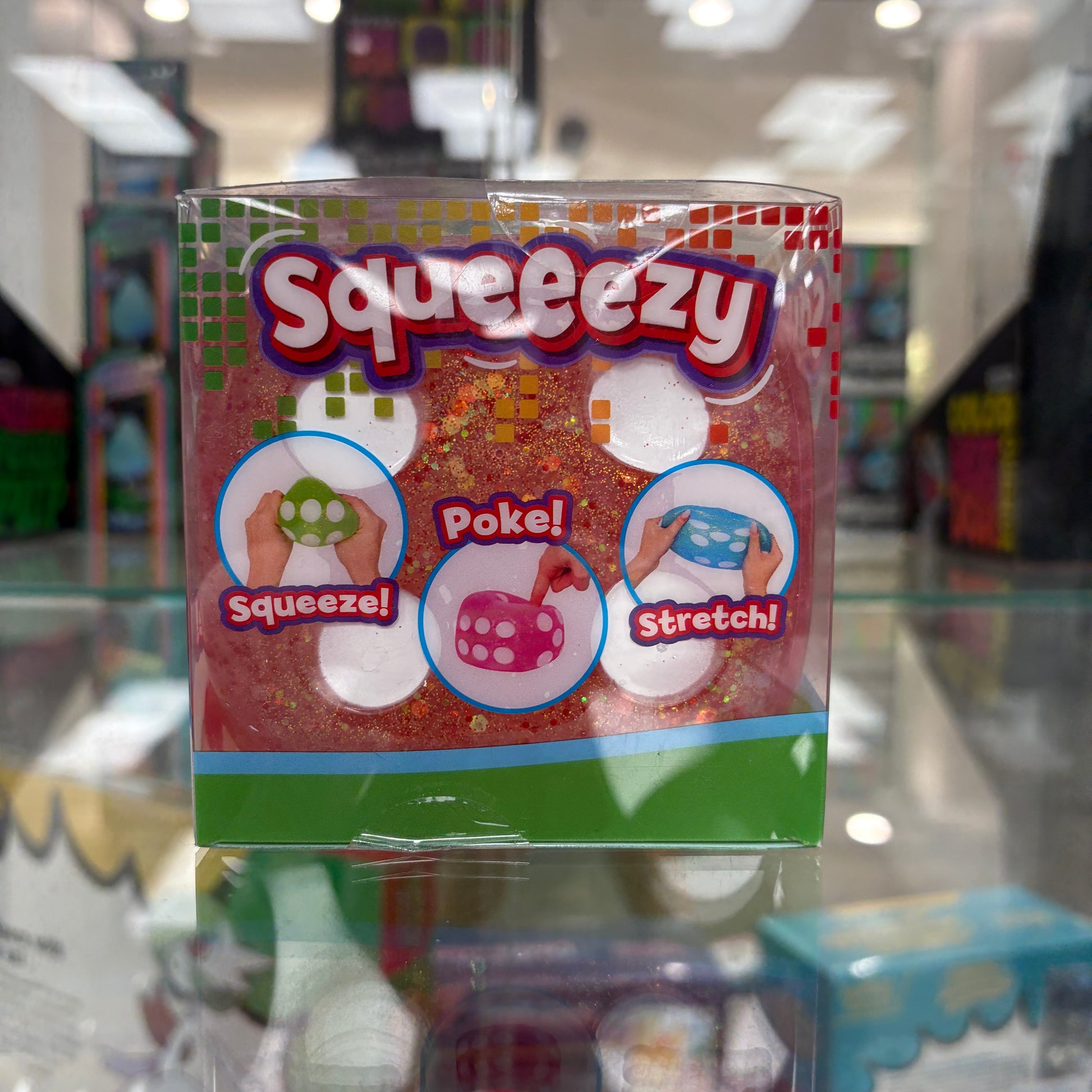 Sunny Days Entertainment Squeezy Red Glitter Dice Fidget Toy