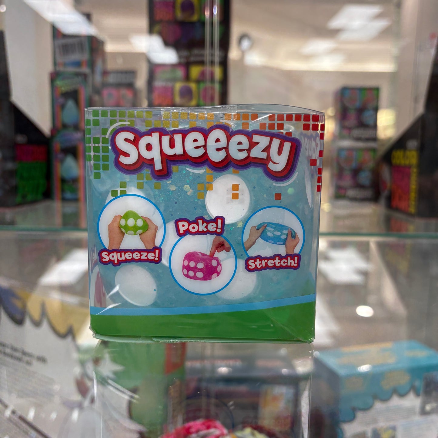 Sunny Days Entertainment Squeezy Blue Glitter Dice Fidget Toy